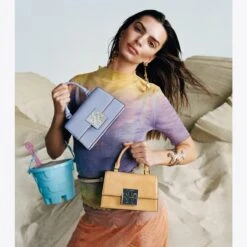 Tory Burch Bon Bon Textured Patent Mini Top-Handle Bag 12 Tory Burch Bon Bon Textured Patent Mini Top-Handle Bag -Chic Style Shop Bon20Bon20Textured20Patent20Mini20Top Handle20Bag.TB Campaign 20230419 EOMC 003.pdp 1200x1200 1