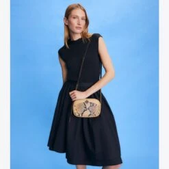 Tory Burch McGraw Snake Embossed Camera Bag -Chic Style Shop McGraw20Snake20Embossed20Camera20Bag.TB On Model Editorial 20230711 EOMS.pdp 1200x1200 1