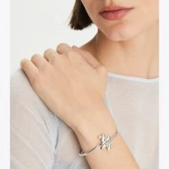Tory Burch Twisted T Flex Cuff 7 Tory Burch Twisted T Flex Cuff -Chic Style Shop Twisted20T20Flex20Cuff.TB 147239 040 20230411 OMACC.pdp 1200x1200 1